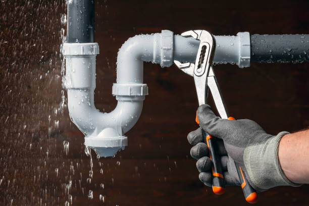 Professional Drain Cleaning technician working in Washington, OK